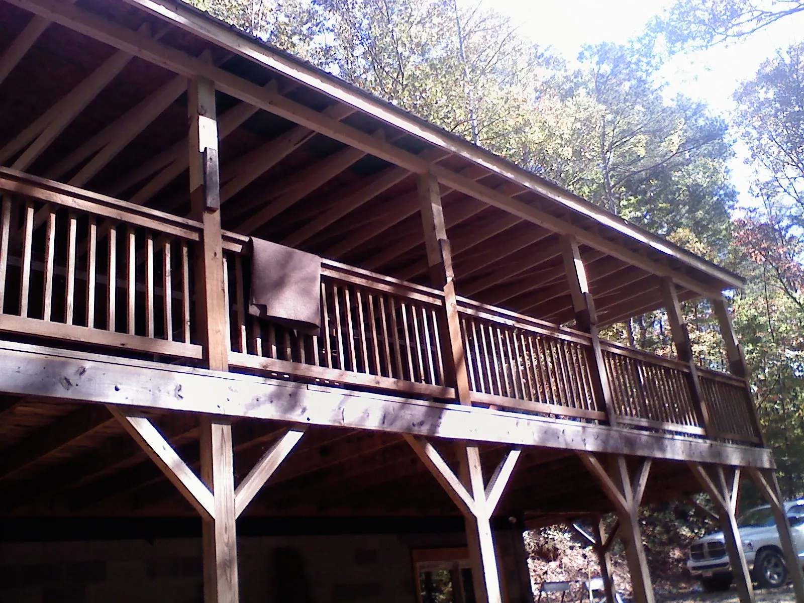 Timber framing under a new elevated porch and deck — Roof Leak Repair in Sauk Centre by Roofing Brothers